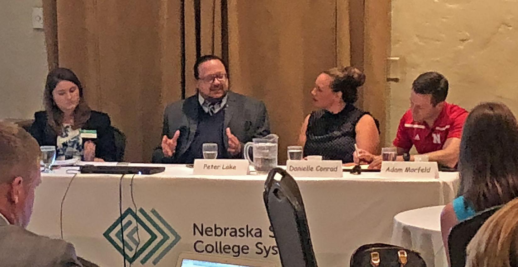 Taylor Sinclair, NSCS System Director for Title IX; Professor Peter Lake; Danielle Conrad, Director of Nebraska ACLU; and Senator Adam Morfeld answer questions during the panel discussion.